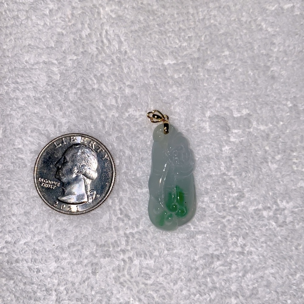Burmese jade pendant and 18k gold clip